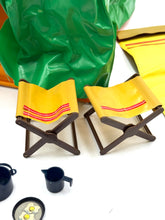 Load image into Gallery viewer, Lifestyle shot of yellow folding chairs included with the camping tent