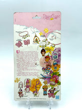 Load image into Gallery viewer, Back view of original packaging for 1983 Hasbro Pimpi Rosa / Charmkins set