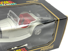 Load image into Gallery viewer, Close-up detail of BBurago Jaguar SS 100 (1937) in transparent packaging