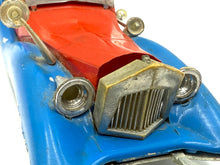 Load image into Gallery viewer, Detail view of the front of Politoys M559 Uncle Scrooge Car with chrome grille and headlights.