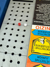 Load image into Gallery viewer, Detail close-up of Big Jim Crime Detector game board with colorful graphics.