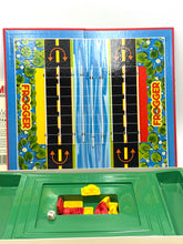 Carica l'immagine nel visualizzatore di Gallery, Contents of 1982 Frogger board game showing board and pieces with colorful graphics