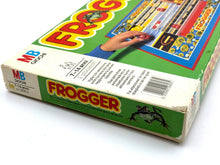 Carica l'immagine nel visualizzatore di Gallery, Side view of 1982 MB Frogger board game box showing game title and illustrations