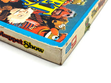 Carica l'immagine nel visualizzatore di Gallery, Side view of The Muppet Show board game box edge highlighting character illustrations.