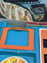 Carica l'immagine nel visualizzatore di Gallery, Scommettiamo game components showing colorful pieces in various shapes.
