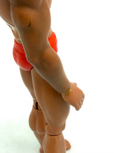 Load image into Gallery viewer, Mattel Big Jim Karate action figure back view showing articulated legs and muscular back.