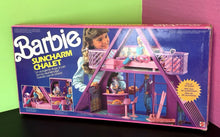 Carica l'immagine nel visualizzatore di Gallery, Mattel Barbie Suncharm Chalet packaging front view with colorful design.