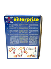Carica l'immagine nel visualizzatore di Gallery, Back view of the blue and yellow game box featuring instructions and illustrations.