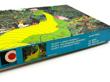 Load image into Gallery viewer, Official Disney Pete’s Dragon Puzzle box packaging showcasing vibrant colors and design.