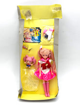 Carica l'immagine nel visualizzatore di Gallery, Bandai Sailor Moon Chibiusa doll in plastic packaging with colorful design.