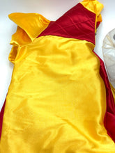 Load image into Gallery viewer, Ferrari Mazzini motocross costume detail of a yellow dress with a satin finish.