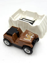 Load image into Gallery viewer, Close-up detail of the Jeep Renegade Golden Eagle toy showing removable top and interior.