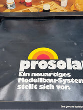 Carica l'immagine nel visualizzatore di Gallery, Detail view of the interior of the Prosolar model kit box with tools and text.