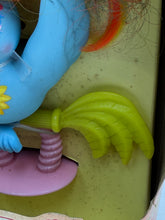 Carica l'immagine nel visualizzatore di Gallery, Detail view of the colorful Blue Bird figure with a leafy tail and spring base.