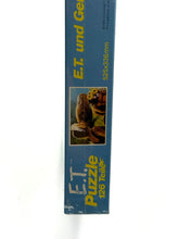 Load image into Gallery viewer, Side view of the vintage Waddingtons E.T. jigsaw puzzle box featuring ET and Gertie.