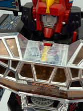 Load image into Gallery viewer, Side view of the robot toy highlighting the detailed cockpit and articulated limbs.