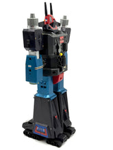 Load image into Gallery viewer, Side view of the robot toy emphasizing mechanical details and standing pose.