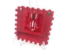 Carica l'immagine nel visualizzatore di Gallery, Back view of the red Takara Diaclone Power Base accessory showing textured surface