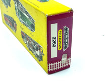 Load image into Gallery viewer, Side profile of vintage Trix Express V200 locomotive