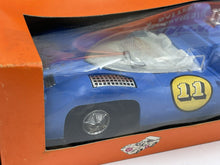 Load image into Gallery viewer, Side profile of Chaparral 2F toy car showcasing sleek design