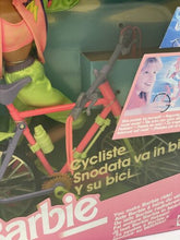 Load image into Gallery viewer, Close-up of Mattel Barbie Bicyclin featuring the doll with a bicycle and helmet.