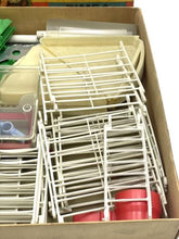 Load image into Gallery viewer, Close-up detail of Pimea Chalet toy bird house game components in various shapes.