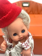 Carica l'immagine nel visualizzatore di Gallery, FURGA AUTO-BABY Mini Doll close-up of smiling face with blue eyes and knitted hat