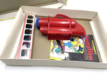 Load image into Gallery viewer, Kenner Give a Show projector packaging showing red plastic object with accessories and colorful graphics.