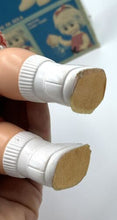 Load image into Gallery viewer, Detail close-up of the 1967 Mattel Walk n Play doll's feet showing white bandages.
