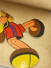 Load image into Gallery viewer, Close-up of a cartoon character puzzle piece with animated design and colorful attire.