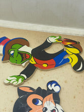 Load image into Gallery viewer, Detail of a colorful puzzle piece with vibrant cartoon character design.