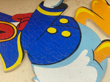 Load image into Gallery viewer, Close-up of a colorful bird design featuring blue and yellow colors.