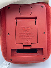 Load image into Gallery viewer, Detail shot of the toy base with battery compartment and instruction label.