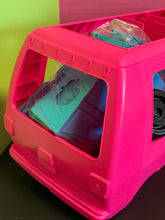 Carica l'immagine nel visualizzatore di Gallery, Back view of the pink toy vehicle with transparent windows.
