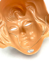 Load image into Gallery viewer, Detail close-up of an orange head figurine with smooth surface and facial features