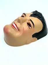 Load image into Gallery viewer, Detail close-up of a smiling male head figurine with skin-tone and black hair