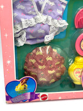 Load image into Gallery viewer, Detail close-up of toy accessories showcasing colorful designs in pink, purple, and yellow.