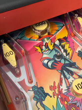 Load image into Gallery viewer, 1978 stardrake pinball detail close-up of colorful artwork featuring character illustrations.