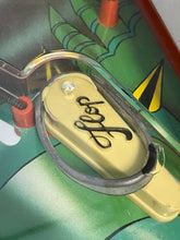 Load image into Gallery viewer, 1978 stardrake pinball detail close-up of a green object with attached cables and a label.