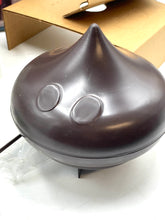 Load image into Gallery viewer, Detail close-up of a brown aroma diffuser with two buttons and rounded shape.