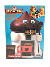 Load image into Gallery viewer, Coleco Toy Mr Chocolate Drink Maker packaging featuring a chocolate dispenser and included spoon.