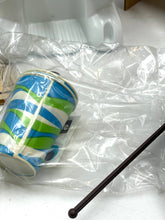 Load image into Gallery viewer, Detail close-up of a blue and green striped ceramic mug.