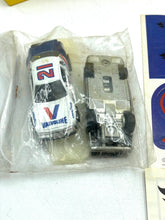 Carica l'immagine nel visualizzatore di Gallery, Hot Wheels Speed Shifter 500 packaged toy cars in white, blue, and gray on a white background.