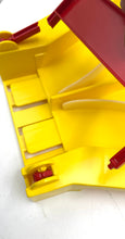 Carica l'immagine nel visualizzatore di Gallery, Hot Wheels Speed Shifter 500 yellow plastic part with a curved shape on a white background.