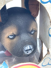 Load image into Gallery viewer, Close-up of the German Shepherd toy puppy face showing realistic eyes and textured fur.