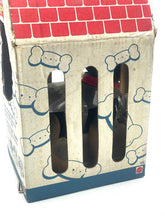 Load image into Gallery viewer, Side view of the German Shepherd toy in its red and beige dog house box.