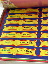 Carica l'immagine nel visualizzatore di Gallery, Detail close-up of colorful labels with various designs from Clementoni 1980 Board Game.