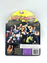 Load image into Gallery viewer, 1993 street fighter 2 guile action figures in plastic packaging