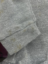 Load image into Gallery viewer, Close-up of fabric texture showing soft texture and stitching detail.