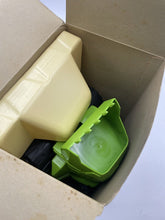 Load image into Gallery viewer, Joustra DinoToys Rhino Bull Dump Truck inside packaging view showing the green container.